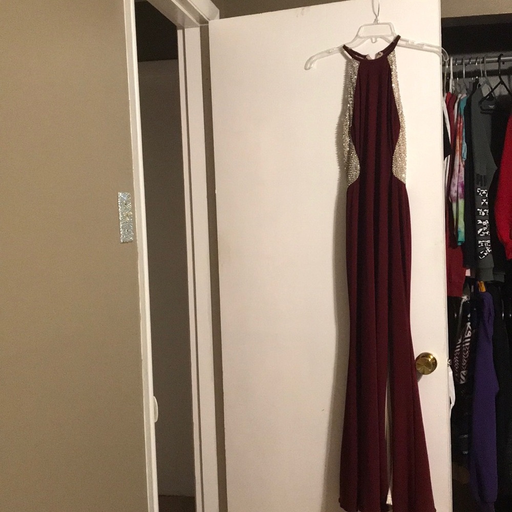 Maroon dress with beading on the back.